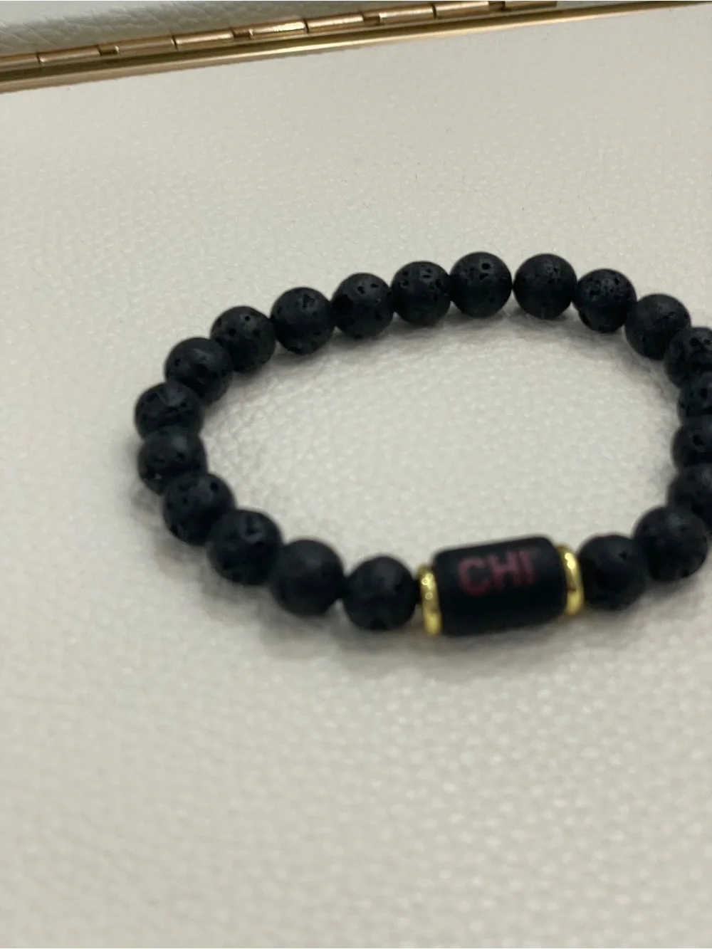 CHI Black Lava Bead Bracelet with Gold Accents